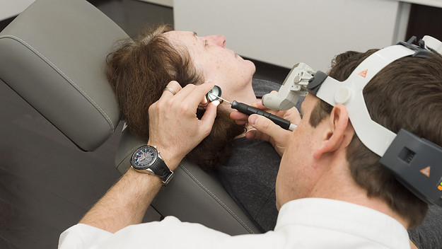 ENT doctor treating patients suffering from dizziness