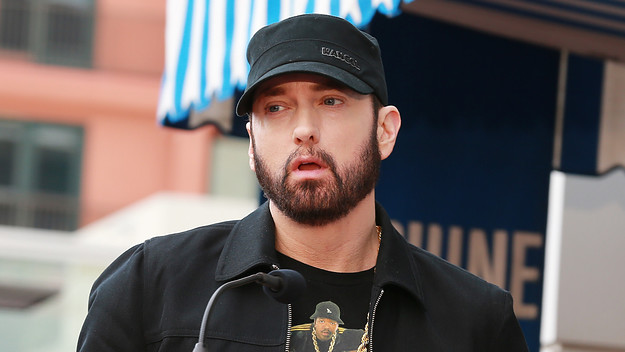 Eminem speaks during a ceremony honoring 50 Cent