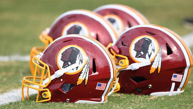 Redskins helmets lined up at training camp.