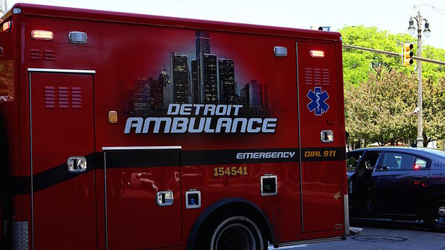 A Detroit Ambulance makes its way through downtown in Detroit