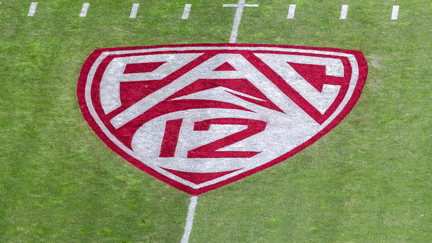 A detail view of the Pac 12 logo on the field at Stanford Stadium