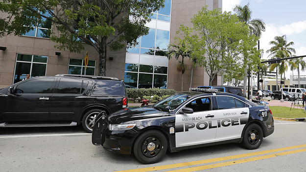 A Miami Beach police car sits outside the headquarters of CONCACAF