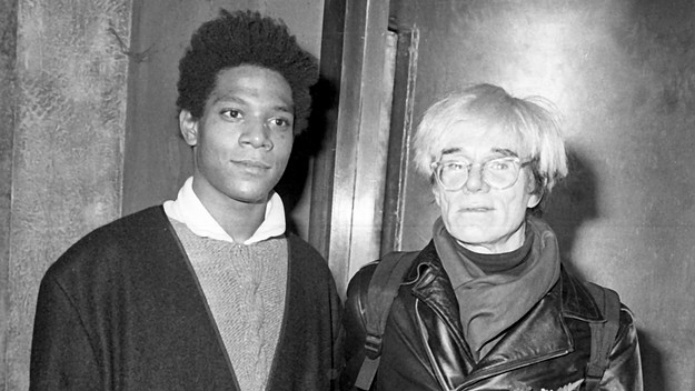 Jean Michel Basquiat and Andy Warhol attend Gifts For The City Of New York Benefit.