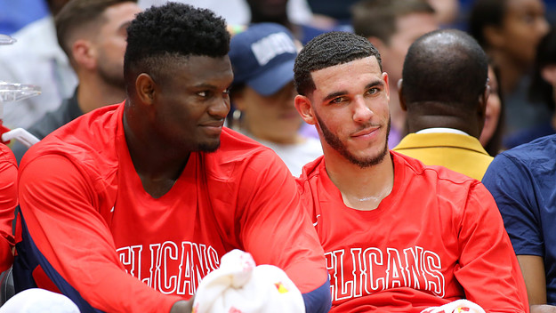 Zion Williamson and Lonzo Ball talk during the second half of a game against the Utah Jazz.