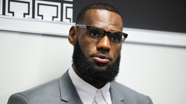 LeBron James addresses media following the grand opening of I Promise school.