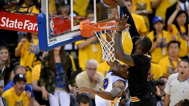 LeBron James blocks Andre Iguodala during Game 7 of the 2016 NBA Finals.