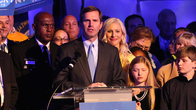 Andy Beshear celebrates
