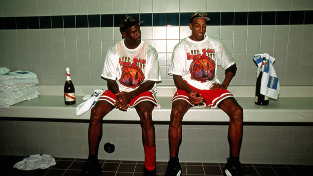 Michael Jordan and Scottie Pippen celebrate in the locker room after winning 1998 NBA Championship.