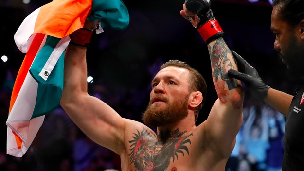 Conor McGregor celebrates after defeating Donald Cerrone