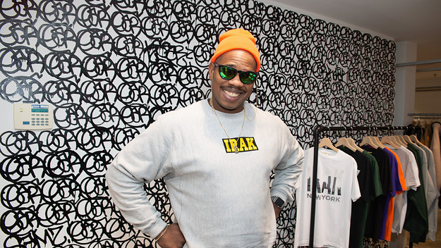 Kunle F. Martins, Aka Earsnot, at his IRAK Installation in Dover Street Market New York