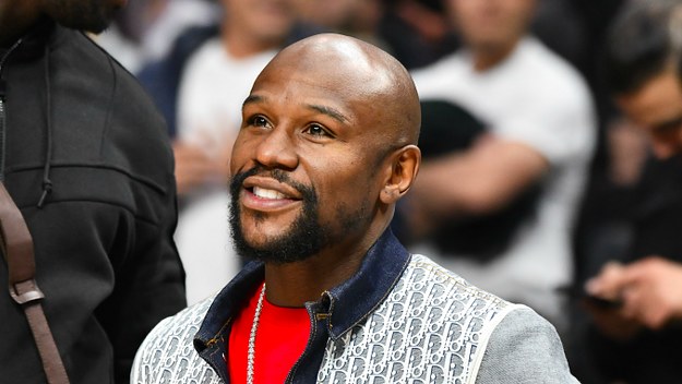 Floyd Mayweather Jr. attends a basketball game