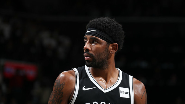 Kyrie Irving #11 of the Brooklyn Nets looks on against the New York Knicks