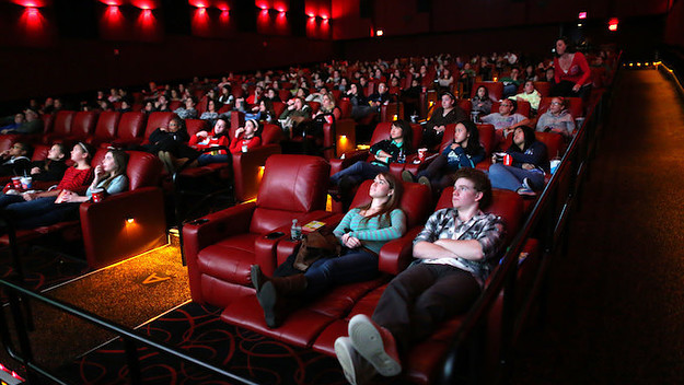 People relax in all powered recliner seats at AMC Movie Theater.