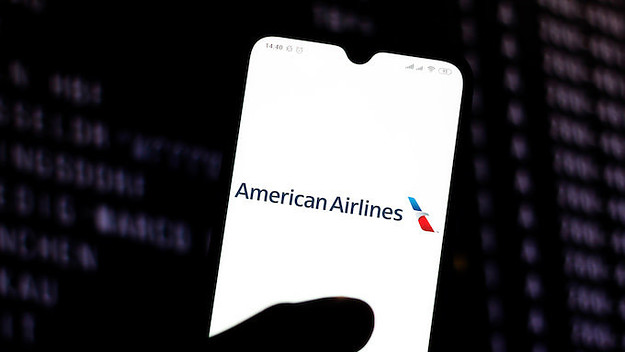 American Airlines logo is seen displayed on a smartphone.