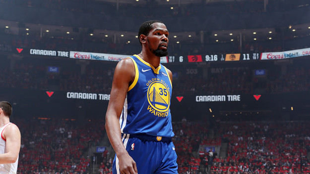 Kevin Durant #35 of the Golden State Warriors looks on