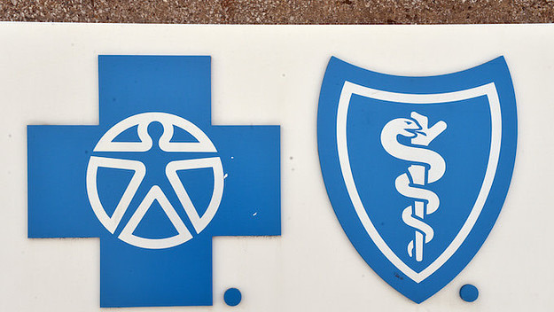 The logo of Blue Cross Blue Shield pictured in the city centre of Detroit.