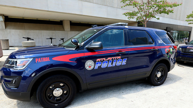 An Atlanta police vehicle sits parked outside State Farm Arena