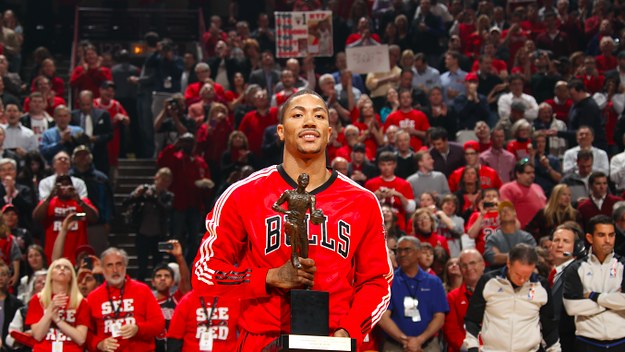 Derrick Rose #1 of the Chicago Bulls poses with KIA Motors NBA MVP Trophy