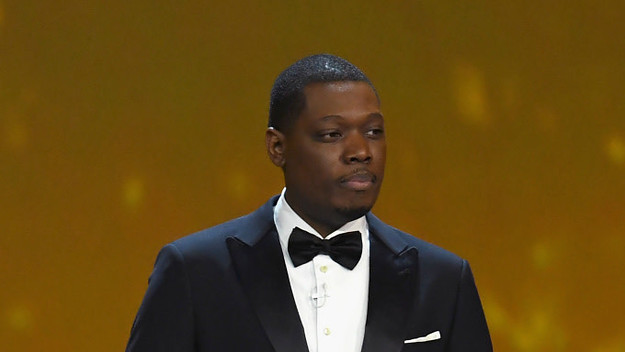 Michael Che speaks onstage during the 70th Emmy Awards