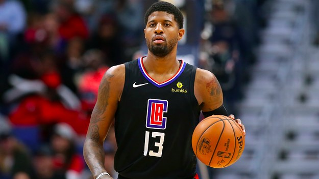 Paul George #13 of the LA Clippers reacts during a game