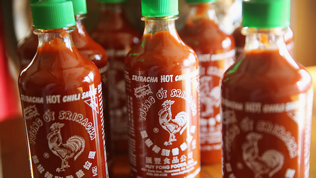 Bottles of Sriracha hot chili sauce are shown.
