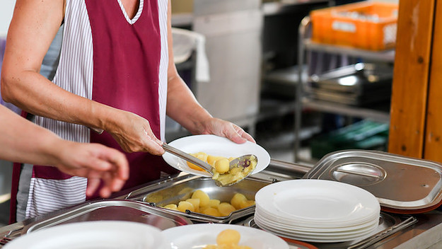 Lunch is served in the cafeteria of the primary school at Wuhlheide.