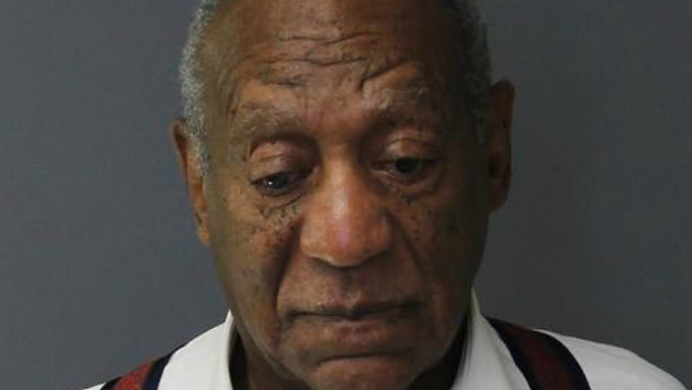 Bill Cosby poses for a mugshot