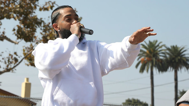 Nipsey Hussle speaks to kids at the Nipsey Hussle x PUMA Hoops Basketball Court