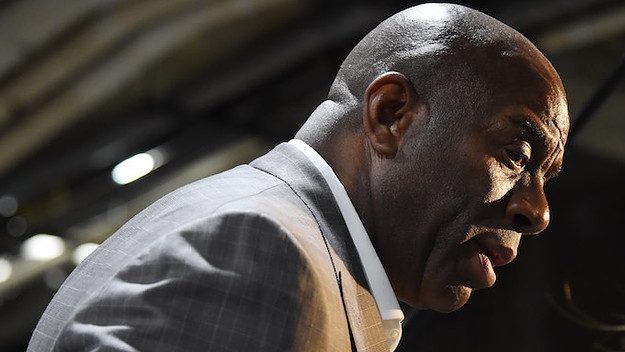 Magic Johnson looks on during the game between the Portland Trail Blazers and Los Angeles Lakers