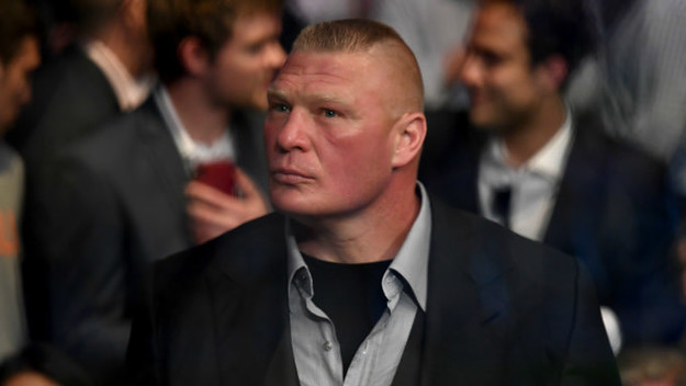 Brock Lesnar watches the fights during the UFC 226