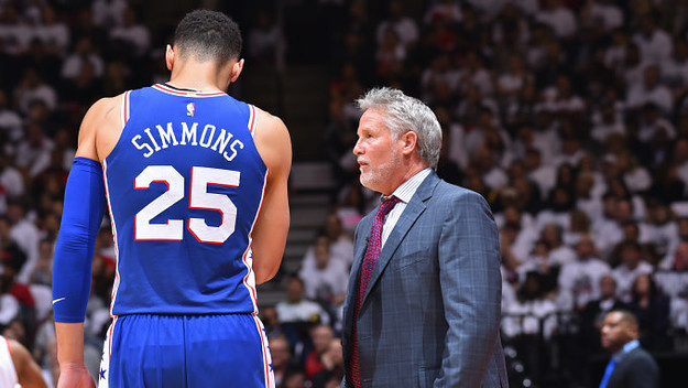 Ben Simmons #25 of the Philadelphia 76ers and Head Coach Brett Brown
