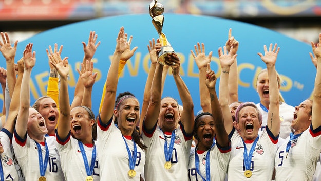 Carli Lloyd of the USA lifts the FIFA Women's World Cup Trophy
