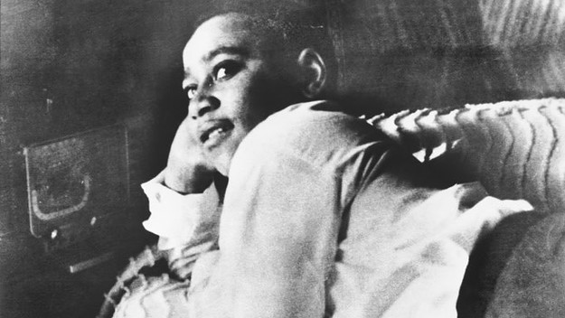 Emmett Till is shown lying on his bed