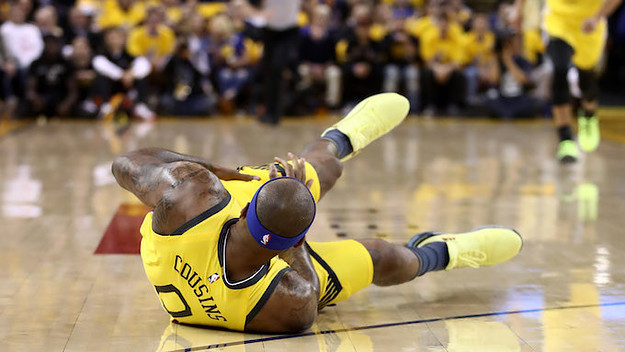 DeMarcus Cousins falls after injuring himself.