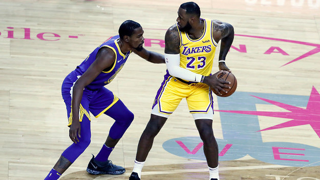 LeBron James #23 of the Los Angeles Lakers handles the ball