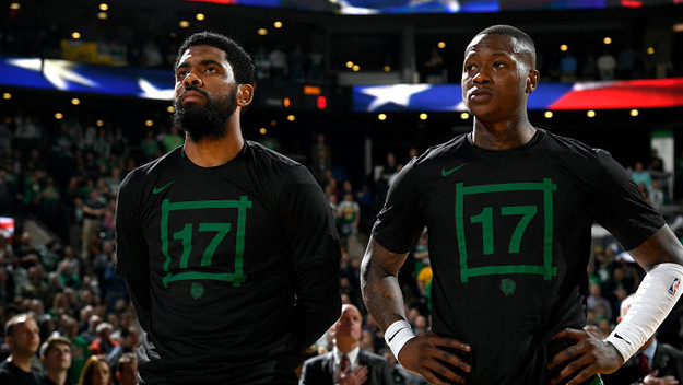 Kyrie Irving #11 and Terry Rozier #12 of the Boston Celtics