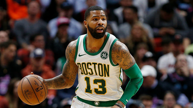 Marcus Morris #13 of the Boston Celtics dribbles with the ball against the Miami Heat