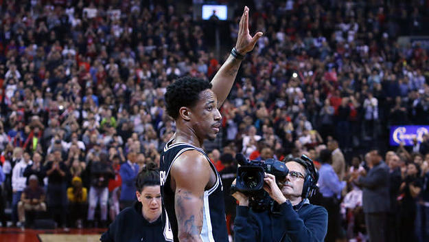DeMar DeRozan waves to the Toronto crowd in his first game back.