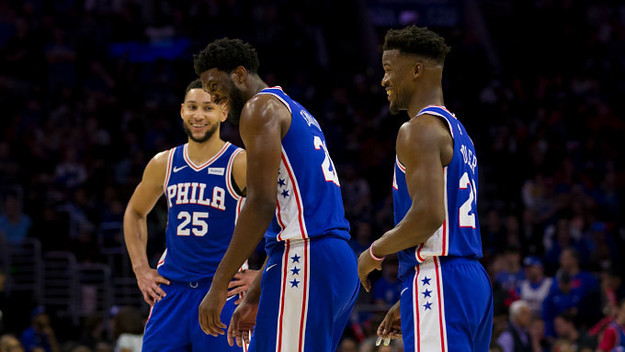 Ben Simmons #25, Joel Embiid #21 and Jimmy Butler #23 of the Philadelphia 76ers