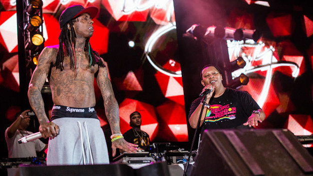 Lil Wayne (L) and Mannie Fresh perform at Lil Weezyana Festival