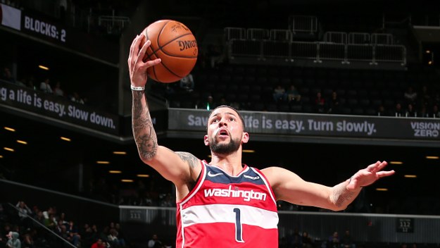 Austin Rivers of the Washington Wizards drives to the basket