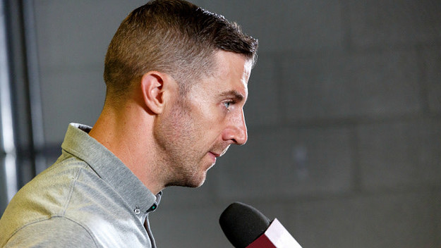Quarterback Alex Smith #11 of the Washington Redskins addresses the media