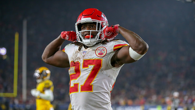 Kareem Hunt (27) celebrates after his teammate scores