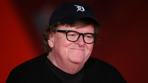 Michael Moore walks the red carpet