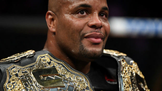 Daniel Cormier celebrates after his submission victory over Derrick Lewis