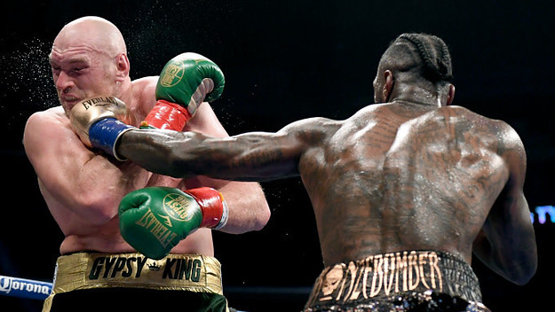Deontay Wilder punches Tyson Fury in the fifth round