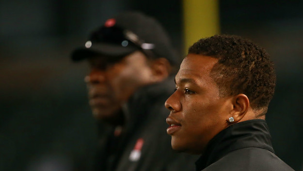 Running back coach Ray Rice of the from the sideline