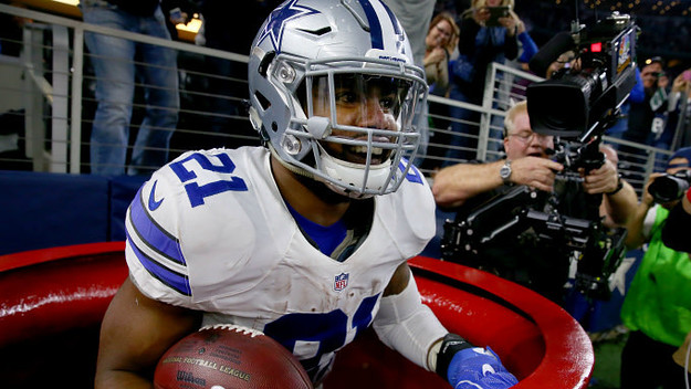 Ezekiel Elliott #21 of the Dallas Cowboys celebrates after scoring a touchdown
