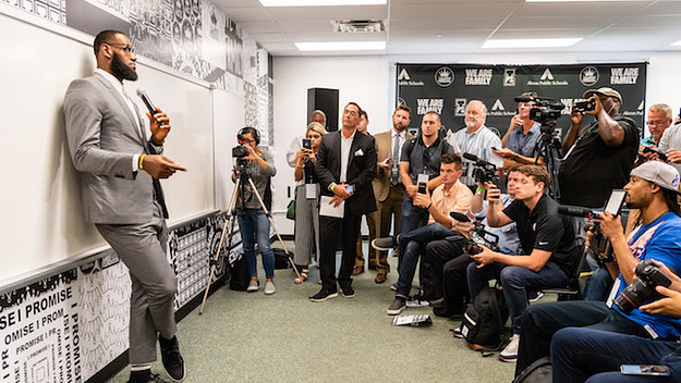 LeBron James addresses the media after the opening ceremonies of the I Promise School.