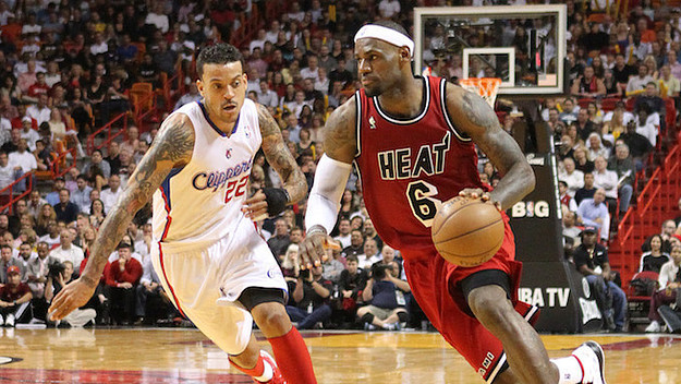 The Miami Heat's LeBron James drives against the Los Angeles Clippers' Matt Barnes.